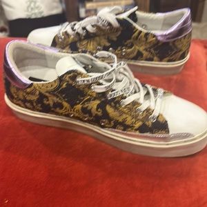 Golden Goose size 12 runs small, if you wear a size 11 these will fit you fine.